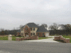 Custom Built Home in Fairway Estates on lot 8 with brick entrance